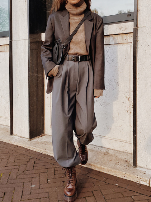 Pour ou contre un pantalon masculin gliss dans une paire de bottines ?