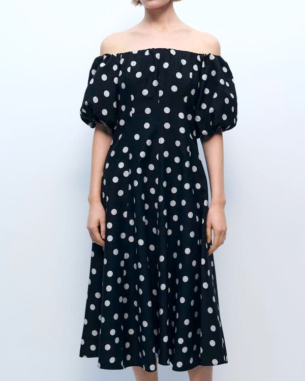 Robe noire à pois blancs